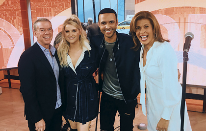 Radio host Elvis Duran (left) named Rayvon artist of the month for January 2018. He posed with Meghan Trainor and Today host Hoda Kotb after performing his single, “Gold.”